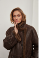 A stylish sheepskin coat made of natural chocolate-colored sheepskin in the VINTAGE style