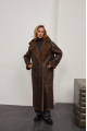 A stylish sheepskin coat made of natural chocolate-colored sheepskin in the VINTAGE style