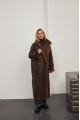 A stylish sheepskin coat made of natural chocolate-colored sheepskin in the VINTAGE style