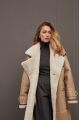 Sheepskin coat made of natural beige sheepskin