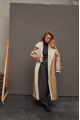 Sheepskin coat made of natural beige sheepskin