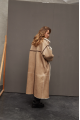 Sheepskin coat made of natural beige sheepskin