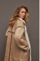 Sheepskin coat made of natural beige sheepskin