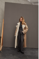 Sheepskin coat made of natural beige sheepskin