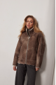 Women's short sheepskin coat in VINTAGE style made of brown natural sheepskin