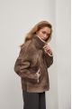 Women's short sheepskin coat in VINTAGE style made of brown natural sheepskin