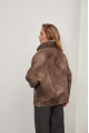 Women's short sheepskin coat in VINTAGE style made of brown natural sheepskin