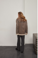 Stylish women's sheepskin coat made of gray natural sheepskin in VINTAGE style