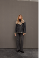 Stylish women's sheepskin coat in graphite color made of natural sheepskin in VINTAGE style