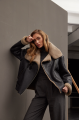 Stylish women's sheepskin coat in graphite color made of natural sheepskin in VINTAGE style