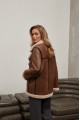 Women's sheepskin coat of red color made of natural sheepskin in VINTAGE style