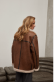 Women's sheepskin coat of red color made of natural sheepskin in VINTAGE style