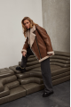 Women's sheepskin coat of red color made of natural sheepskin in VINTAGE style