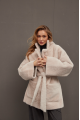 Stylish sheepskin coat in the OVERSIZE style made of natural cream-colored sheepskin