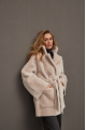 Stylish sheepskin coat in the OVERSIZE style made of natural cream-colored sheepskin