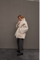 Stylish sheepskin coat in the OVERSIZE style made of natural cream-colored sheepskin