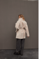 Stylish sheepskin coat in the OVERSIZE style made of natural cream-colored sheepskin