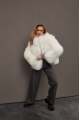 Women's white sheepskin coat made of natural llama