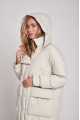 Long white women's down jacket with natural filler in the style of OVERSIZE