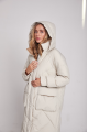 Long white women's down jacket with natural filler in the style of OVERSIZE