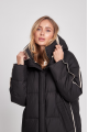 Long black women's down jacket with natural filler in the style of OVERSIZE