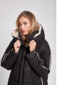 Long black women's down jacket with natural filler in the style of OVERSIZE