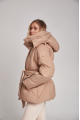 Short women's down jacket of beige color with natural filler