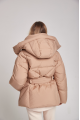 Short women's down jacket of beige color with natural filler