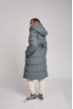 Long down jacket of green color with natural filling