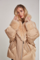 Women's down jacket of beige color with mink fur and decorative knitting and natural filler