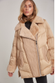 Women's down jacket of beige color with mink fur and decorative knitting and natural filler