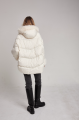 Women's down jacket of white color with cashmere lamb fur and natural filling