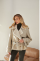 Women's vintage sheepskin coat made of natural white sheepskin