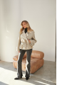 Women's vintage sheepskin coat made of natural white sheepskin