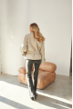 Women's vintage sheepskin coat made of natural white sheepskin