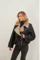 A stylish sheepskin coat made of natural black sheepskin in VINTAGE style