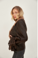 Stylish sheepskin coat made of chocolate-colored natural sheepskin in VINTAGE style