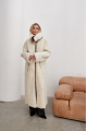 Women's long sheepskin coat made of white natural sheepskin