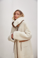 Women's long sheepskin coat made of white natural sheepskin