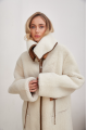 Women's long sheepskin coat made of white natural sheepskin