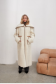 Women's long sheepskin coat made of white natural sheepskin