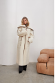 Women's long sheepskin coat made of white natural sheepskin