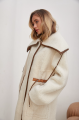 Women's long sheepskin coat made of white natural sheepskin