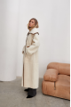 Women's long sheepskin coat made of white natural sheepskin