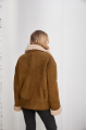 A stylish olive-colored sheepskin coat made of natural sheepskin