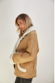 Stylish sand-colored sheepskin coat made of natural sheepskin