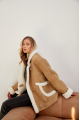 Stylish sand-colored sheepskin coat made of natural sheepskin