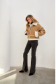 Stylish short sand-colored sheepskin coat made of natural sheepskin