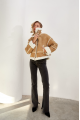 Stylish short sand-colored sheepskin coat made of natural sheepskin