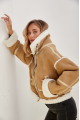 Stylish short sand-colored sheepskin coat made of natural sheepskin